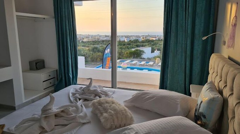 Imagen de la habitación del Hotel Silia Suites. Foto 11