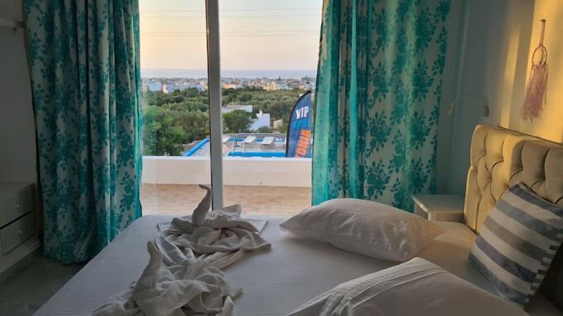 Imagen de la habitación del Hotel Silia Suites. Foto 14