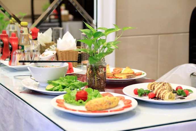 Imagen del bar/restaurante del Hotel Silk Flower and Spa. Foto 2