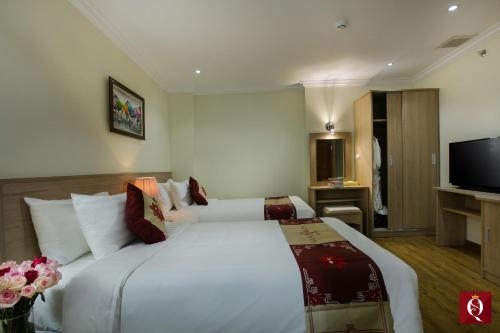 Imagen de la habitación del Hotel Silk Queen Grand. Foto 7