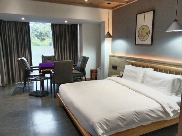 Imagen de la habitación del Hotel Silk Road-Fu Tea Town Boutique Homestay. Foto 2