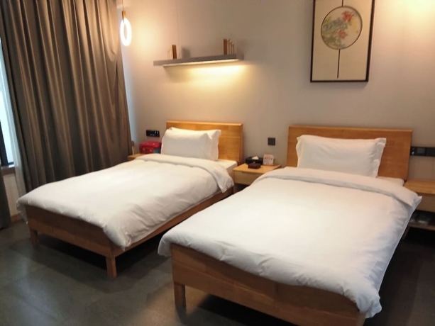 Imagen de la habitación del Hotel Silk Road-Fu Tea Town Boutique Homestay. Foto 3
