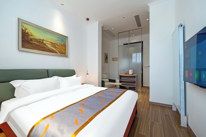 Imagen de la habitación del Hotel Silk Road-Fu Tea Town Boutique Homestay. Foto 4