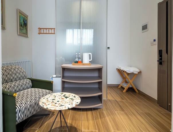 Imagen de la habitación del Hotel Silk Road-Fu Tea Town Boutique Homestay. Foto 5