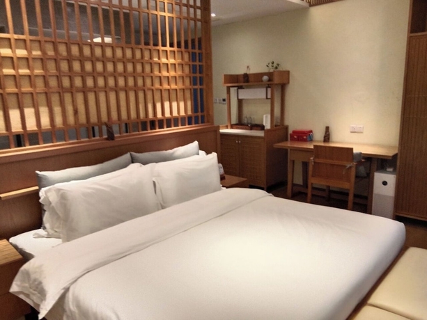 Imagen de la habitación del Hotel Silk Road-Fu Tea Town Boutique Homestay. Foto 10