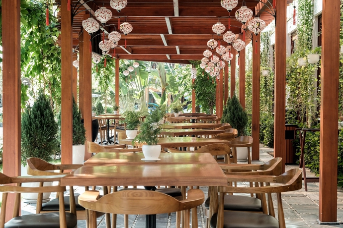 Imagen del bar/restaurante del Hotel Silk Sense Hoi An River Resort, Hoi An. Foto 11