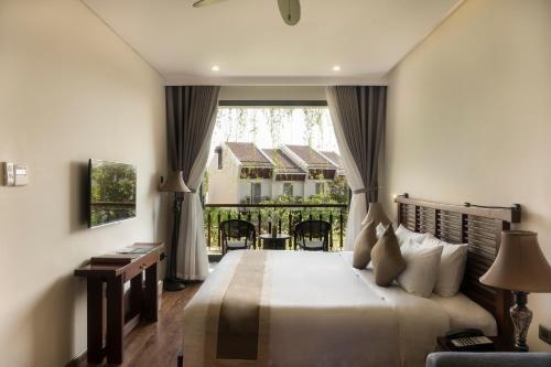 Imagen de la habitación del Hotel Silk Sense Hoi An River Resort, Hoi An. Foto 6