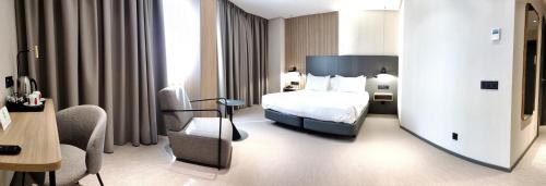 Imagen de la habitación del Hotel Silken Ciudad Gijon. Foto 17