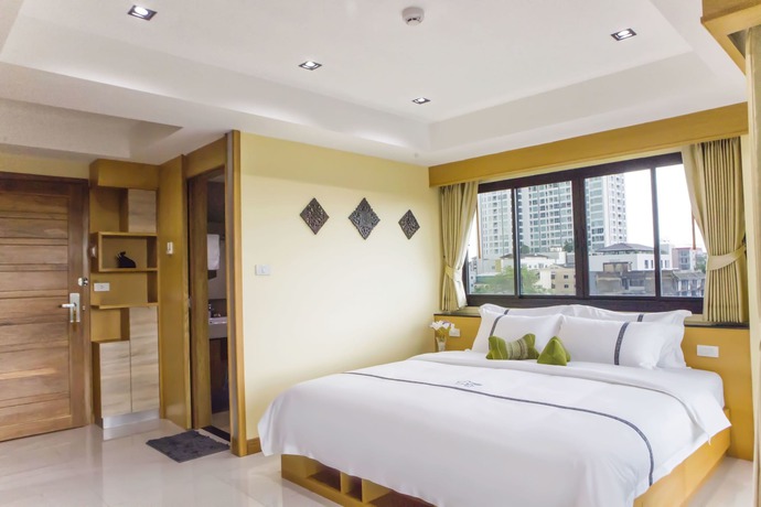 Imagen de la habitación del Hotel Sillemon Garden. Foto 13
