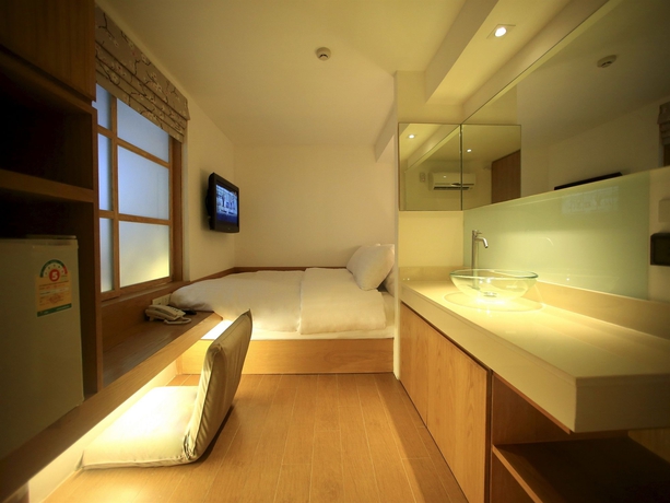 Imagen de la habitación del Hotel Silom One. Foto 10