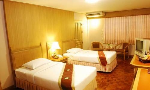 Imagen de la habitación del Hotel Silom Village Inn. Foto 12