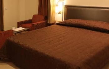 Imagen de la habitación del Hotel Silver Cloud and Banquets Ahmedabad. Foto 11