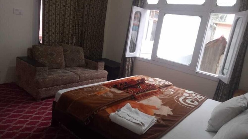 Imagen de la habitación del Hotel Silver Gleam. Foto 7