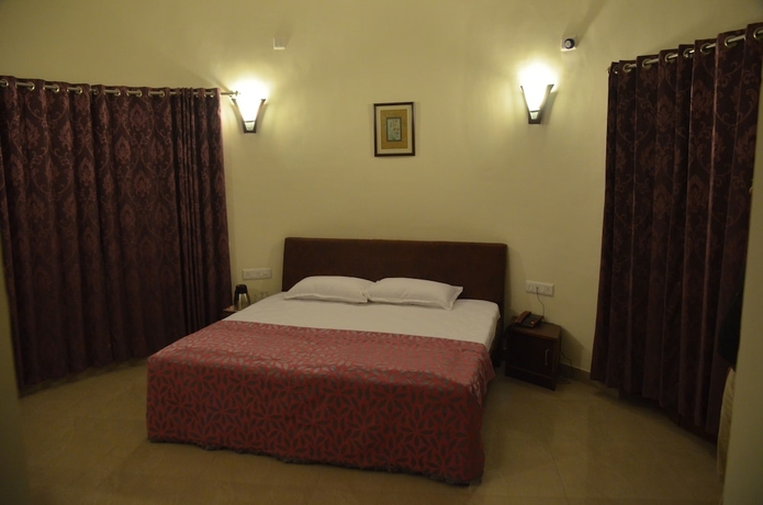 Imagen de la habitación del Hotel Silver Oak Country Yard. Foto 17