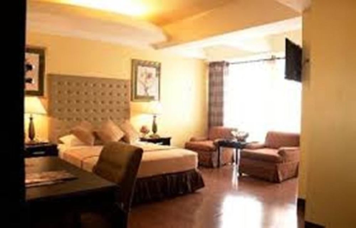 Imagen de la habitación del Hotel Silver Oaks Suite. Foto 4