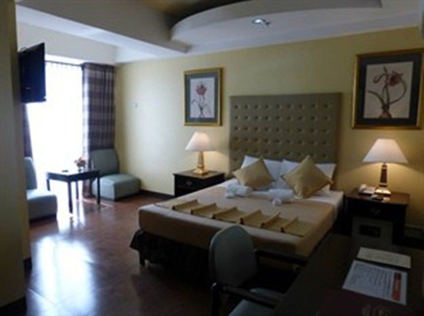Imagen de la habitación del Hotel Silver Oaks Suite. Foto 5