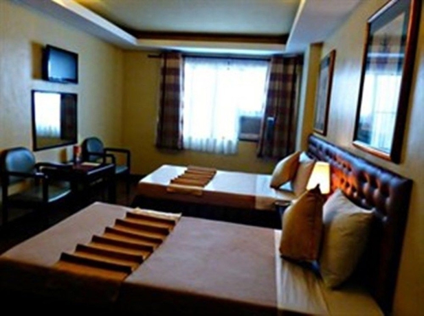 Imagen de la habitación del Hotel Silver Oaks Suite. Foto 6