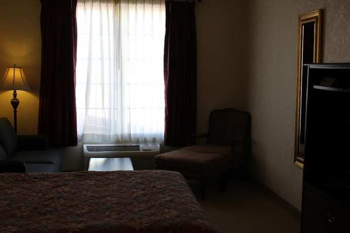 Imagen de la habitación del Hotel Silverland Inn And Suites. Foto 2