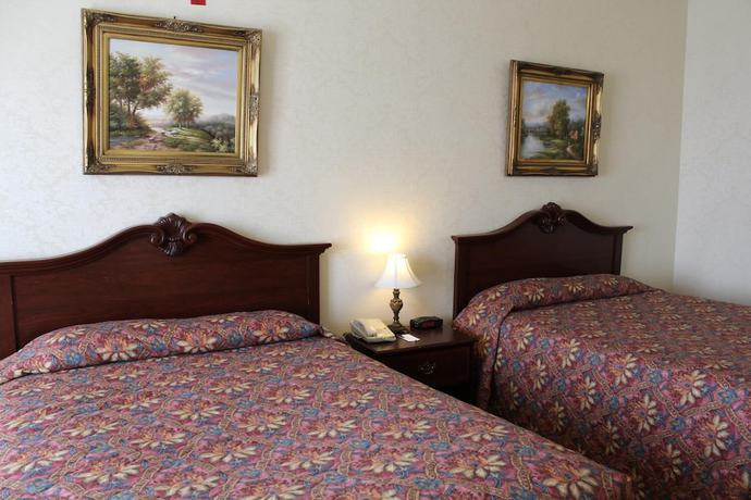 Imagen de la habitación del Hotel Silverland Inn And Suites. Foto 6