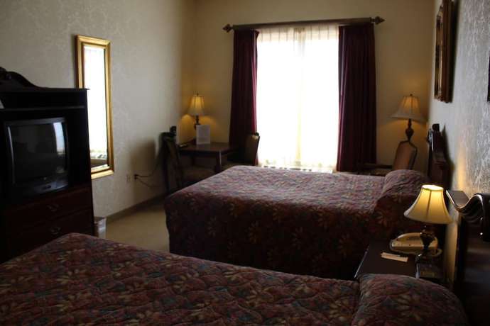 Imagen de la habitación del Hotel Silverland Inn And Suites. Foto 9