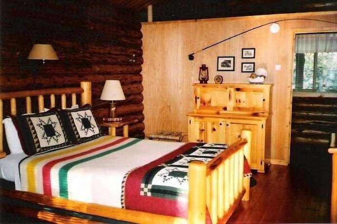 Imagen de la habitación del Hotel Silverwolf Log Chalet Resort. Foto 3