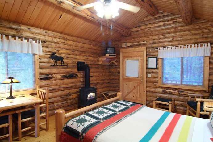 Imagen de la habitación del Hotel Silverwolf Log Chalet Resort. Foto 9
