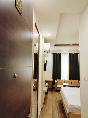 Imagen de la habitación del Hotel Silvora Inn - Bhopal. Foto 14