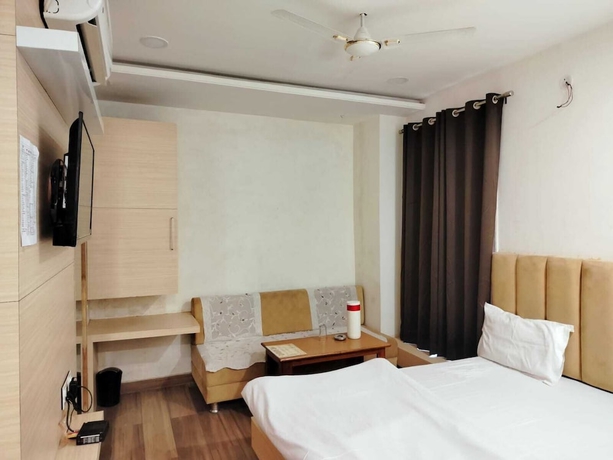 Imagen de la habitación del Hotel Silvora Inn - Bhopal. Foto 15