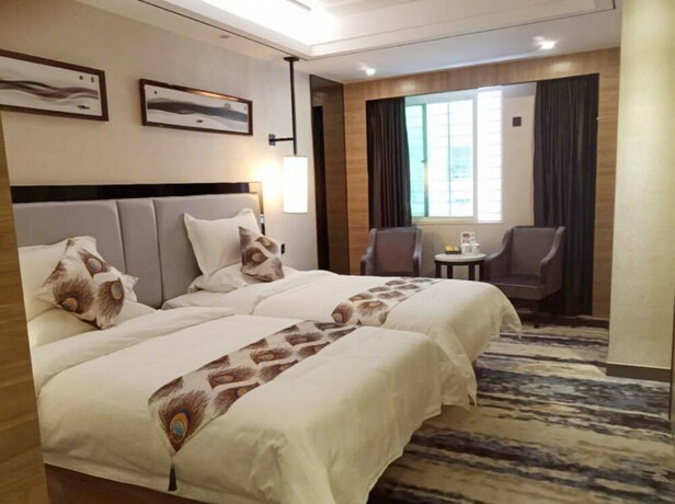 Imagen de la habitación del Hotel Simei Holiday Apartment. Foto 5