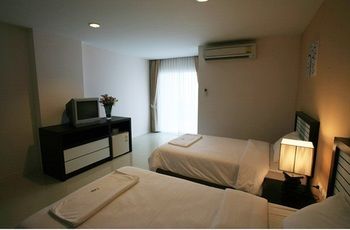 Imagen de la habitación del Hotel Similan Mansion. Foto 11