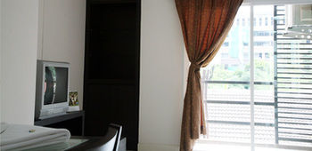 Imagen de la habitación del Hotel Similan Mansion. Foto 12