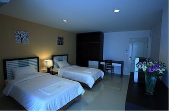 Imagen de la habitación del Hotel Similan Mansion. Foto 13