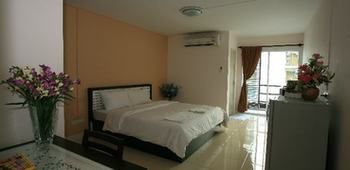 Imagen de la habitación del Hotel Similan Mansion. Foto 16