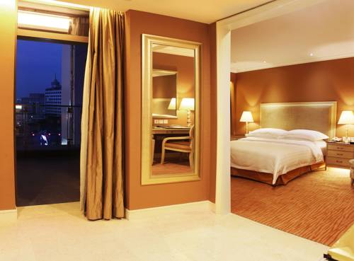 Imagen de la habitación del Hotel Similan Zhuhai. Foto 2