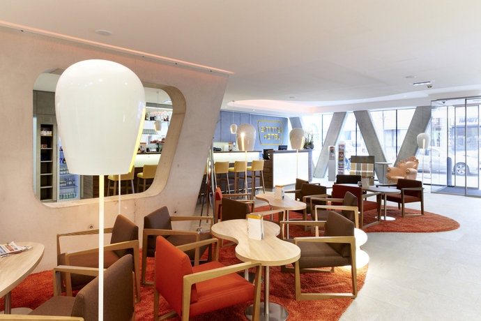 Imagen del bar/restaurante del Hotel Simm’s – The Cityhotel Next To Metro U3. Foto 5