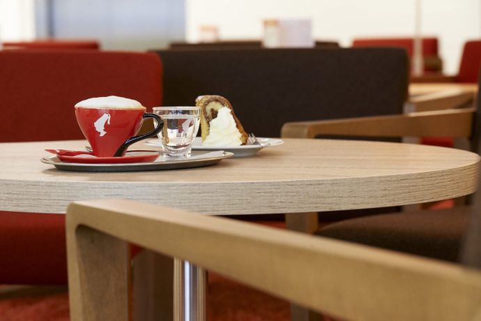 Imagen del bar/restaurante del Hotel Simm’s – The Cityhotel Next To Metro U3. Foto 6