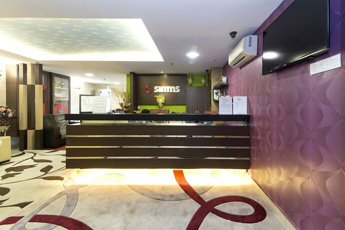 Imagen general del Hotel Simms Grand Inn. Foto 2