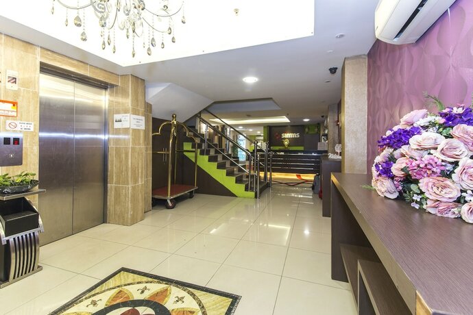 Imagen general del Hotel Simms Grand Inn. Foto 10