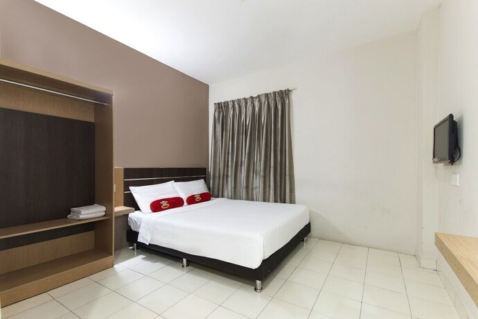 Imagen de la habitación del Hotel Simms Grand Inn. Foto 14