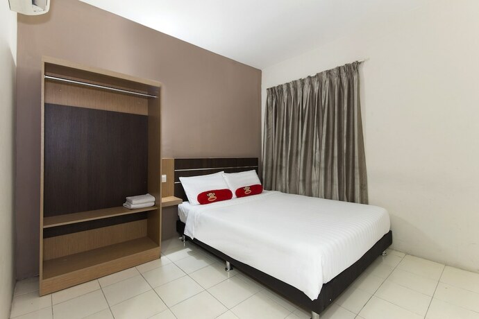 Imagen de la habitación del Hotel Simms Grand Inn. Foto 16