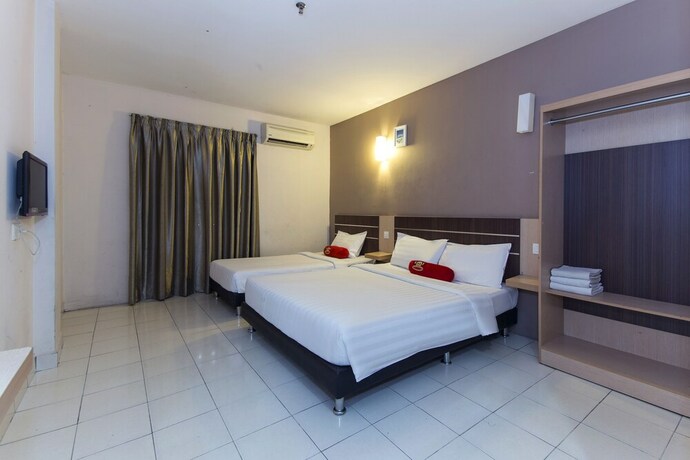 Imagen de la habitación del Hotel Simms Grand Inn. Foto 20