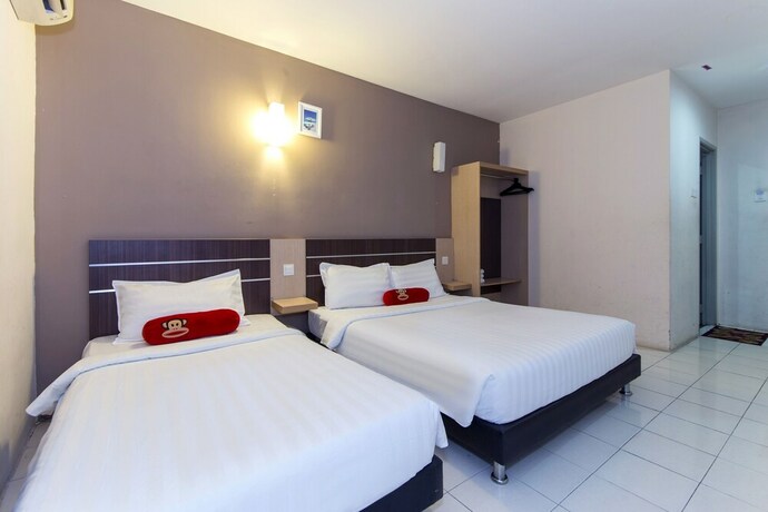 Imagen de la habitación del Hotel Simms Grand Inn. Foto 21