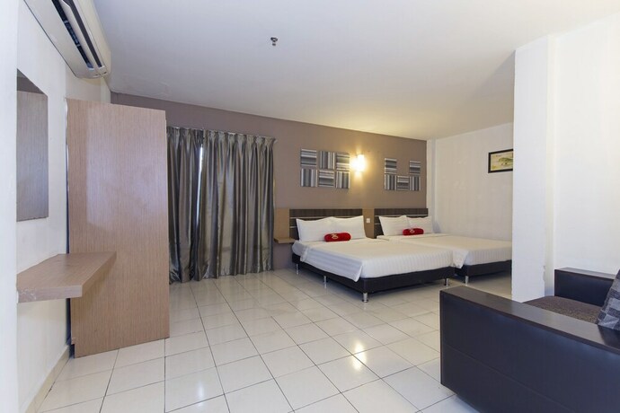 Imagen de la habitación del Hotel Simms Grand Inn. Foto 22