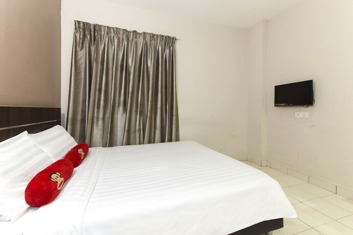 Imagen de la habitación del Hotel Simms Grand Inn. Foto 23