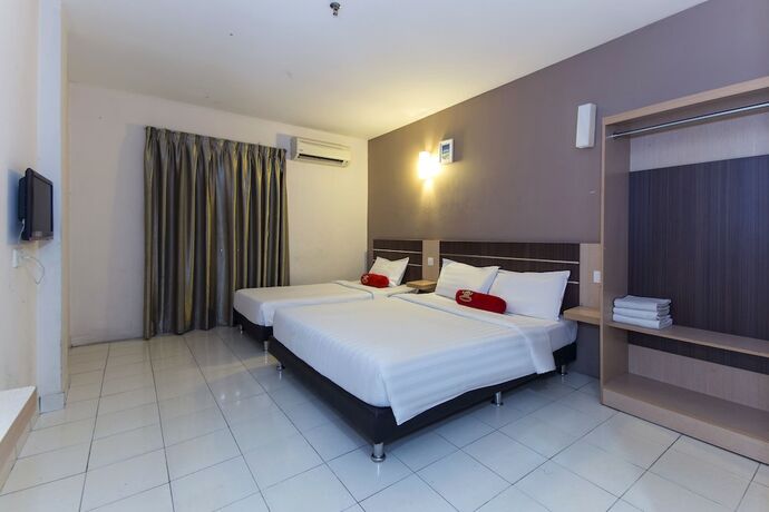 Imagen de la habitación del Hotel Simms Grand Inn. Foto 24