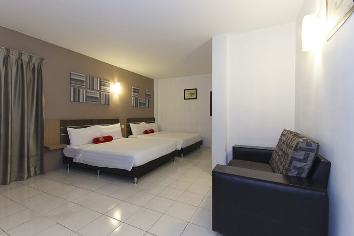 Imagen de la habitación del Hotel Simms Grand Inn. Foto 25