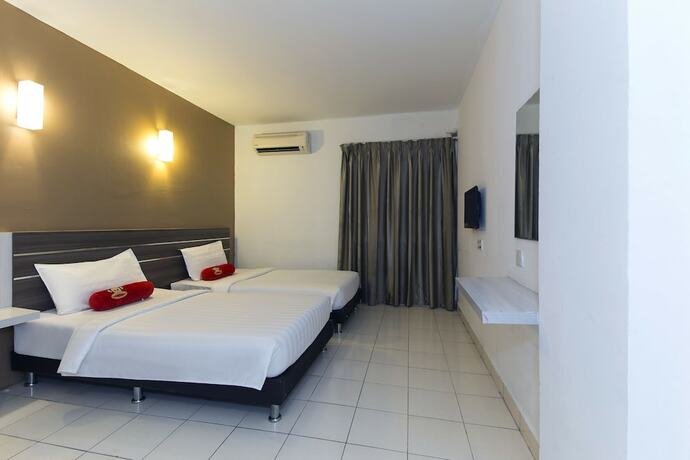Imagen de la habitación del Hotel Simms Grand Inn. Foto 27
