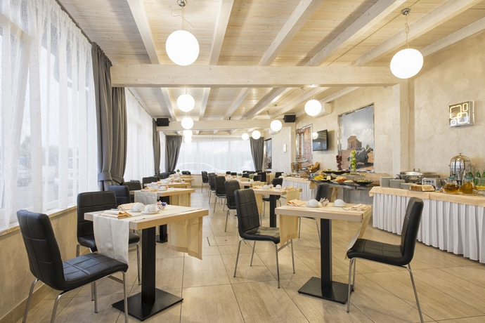 Imagen del bar/restaurante del Hotel Simon, Pomezia. Foto 6