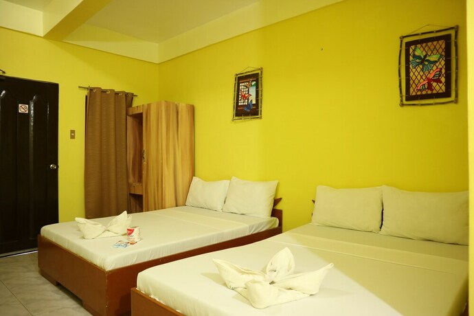 Imagen de la habitación del Hotel Simon's Heritage Resort. Foto 16