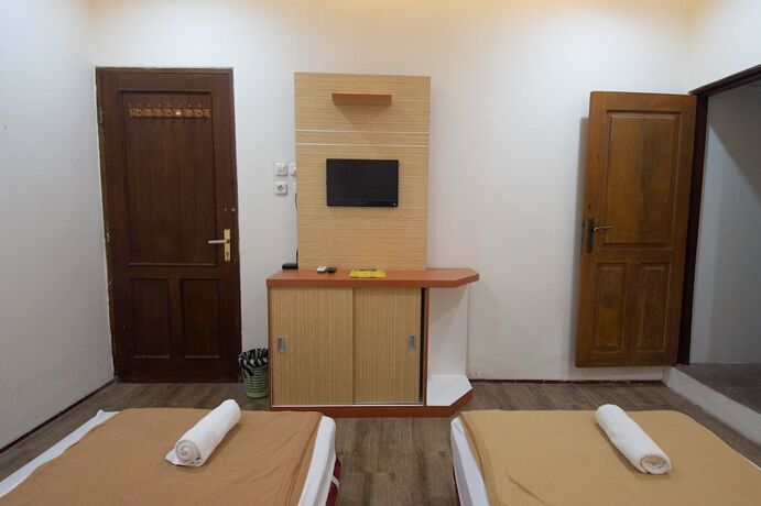 Imagen de la habitación del Hotel Simpang 7 Residence. Foto 13